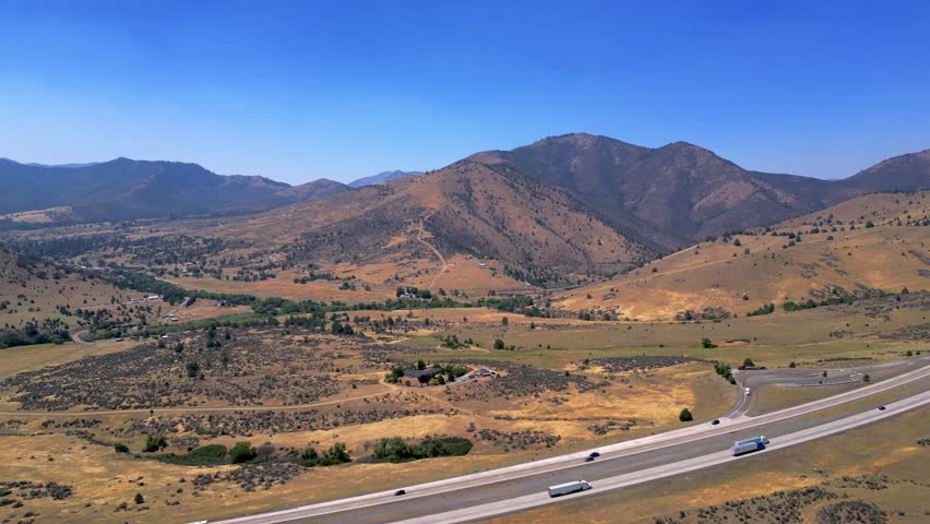 Aerial of highway rest stop in very rural area 