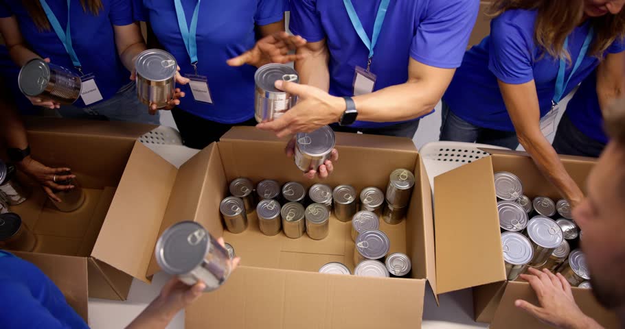 Food Bank Humanitarian Aid In Donation Boxes. Volunteer Community Royalty-Free Stock Footage #1106681263