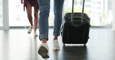 Woman, airport walking and suitcase with feet and luggage going on holiday and closeup travel. Journey, flight and female person shoes with traveling bag and trip in boarding terminal with passenger Arkivvideo