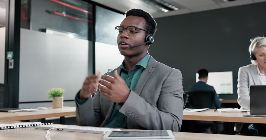 Call center, speaking and man, consultant or agent services, advice or customer support and information in workspace. Communication of african person talking, virtual helping and contact on computer