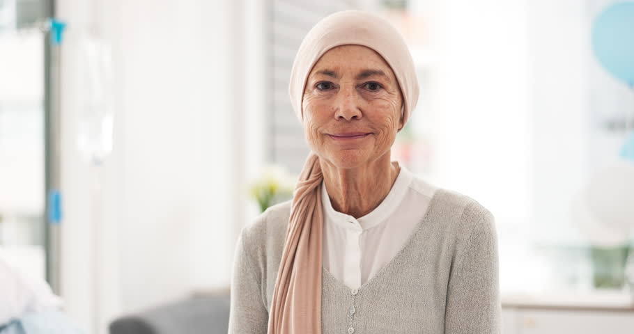 Face, elderly woman and cancer patient in hospital for healthcare, wellness and healing. Portrait, senior and sick person in clinic with strong mindset for courage to fight for health in retirement