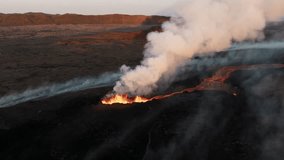 aerial view of A mountain that erupts in the afternoon. Stunning Iceland Volcano Drone. Drone video of Iceland volcano erupting lava.