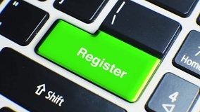 Laptop Keyboard Close Up and Finger Press Register Word or Text Button Key - Powered by Shutterstock - Get 15% off with code: PIKWIZARD15