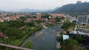 Beautiful river at Vang veng and view the Waterfront,
Stunning aerial views in Laos, captured by drone, Clear waters, Lush green forests and city serene landscapes await, perfect for travel 