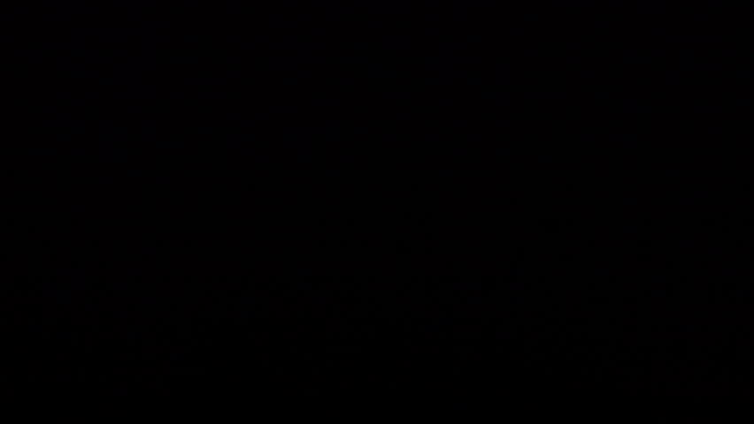 Flashes of lightning in the sky. Shooting at night.