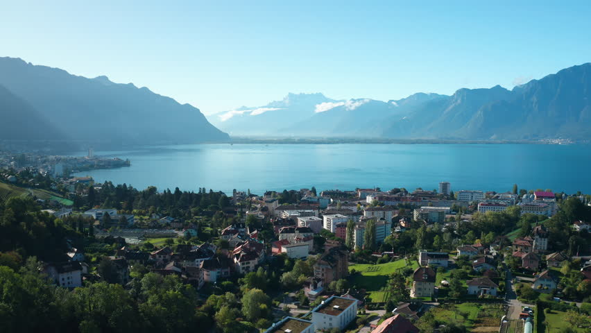 Aerial flight over Montreux City. View to Lake of Geneva and Swiss mountains. Alps Switzerland.Type 3 Royalty-Free Stock Footage #1106719005