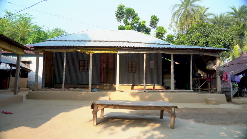 In a peaceful Indian village, a hut basks in the sun