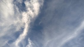 Abstract figures of clouds posing in the sky