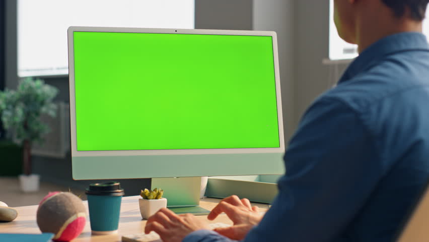 Freelancer using green screen computer in office close up. Unrecognizable business man working chroma key device keyboard. Formal shirt guy preparing conference texting mockup display pc at cabinet | Shutterstock HD Video #1106742925