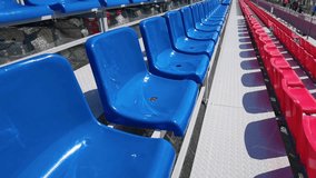 Empty stadium seats. Event chair consruction. Soccer arena. Perspective theater pandemic concept. Moving video 4k. Slow motion - Powered by Shutterstock - Get 15% off with code: PIKWIZARD15