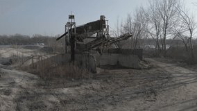 Old abandoned gravel pit on the river. Video recorded by a drone. 4K 30fps.