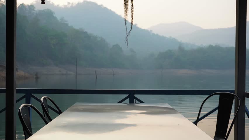 4k relaxing on deck of exotic beach hut bungalow at holiday resort. 