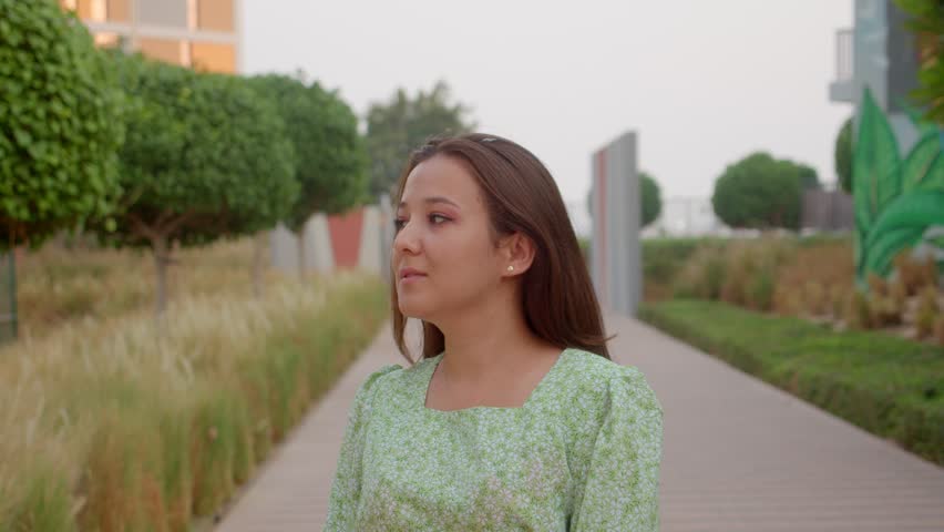 Beautiful girl teen smiles to the camera, 4k slow mo