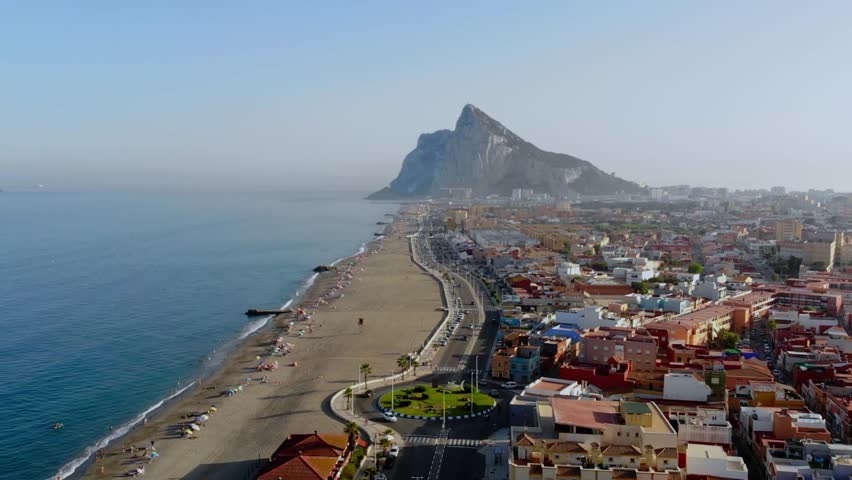Drone footage of Gibraltar rock, moving forwards. Royalty-Free Stock Footage #1106755429