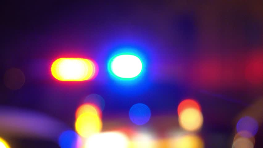 Ambulance bokeh lights blinking in the night.