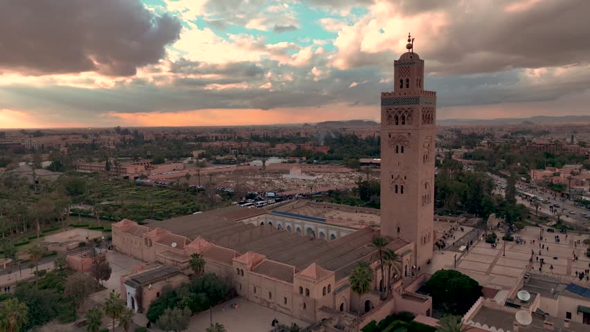 Aerial view the sunset with the koutoubia mosque  the Jemaa el-Fna  square in Marrakech Royalty-Free Stock Footage #1106761737
