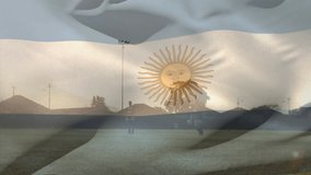 Animation of argentina flag waving over multiracial male players playing with rugby ball on ground. Digital composite, sports, competition, championship, team sport, patriotism and pride concept. - Powered by Shutterstock - Get 15% off with code: PIKWIZARD15