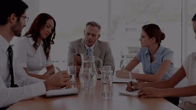 Animation of stock market data processing over diverse businesspeople discussing together at office. Global economy and business data technology concept - Powered by Shutterstock - Get 15% off with code: PIKWIZARD15