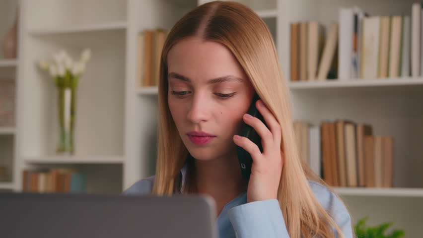 Caucasian business woman female manager girl employer lady businesswoman talking phone answer call bad hearing noisy terrible sound noise in smartphone shocked calling problem in office with laptop Royalty-Free Stock Footage #1106781581