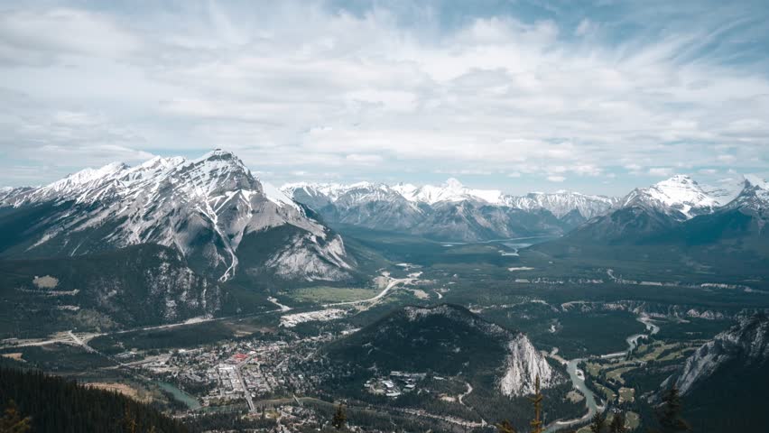 4K time-lapse UHD video of Sulphur Mountain with Mount Rundle and Sulphur Mountain in the background, Alberta, Canada. summer autumn foliage scenery in Banff National Park, Canadian Rockies