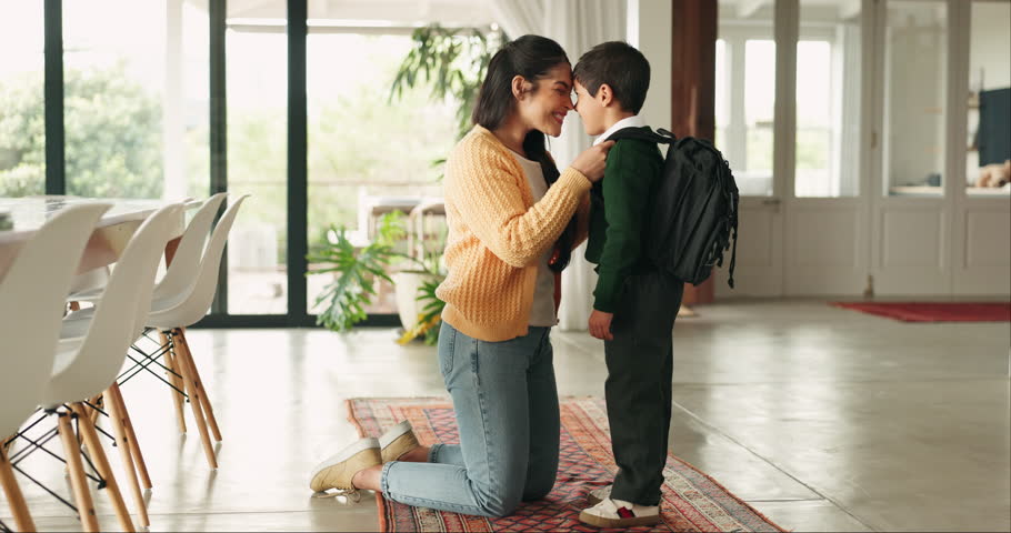 School, ready and mother greet child to start academy, morning routine and leaving house at home. Education, family and happy mom with kid getting dressed for learning, knowledge and help for uniform