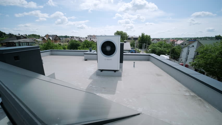 HVAC heating, ventilation and air conditioning systems. Heat pump on the roof Royalty-Free Stock Footage #1106804979
