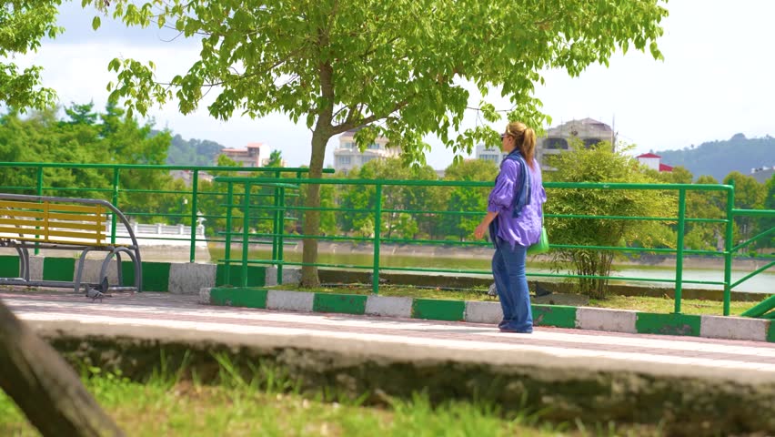 View of beautiful nature and beautiful lake and beautiful girl