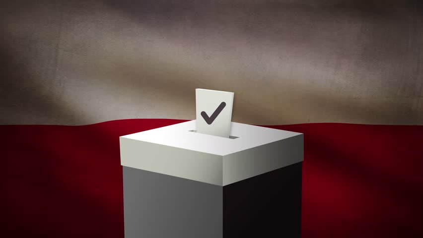 Casting vote into the ballot box during Poland election
