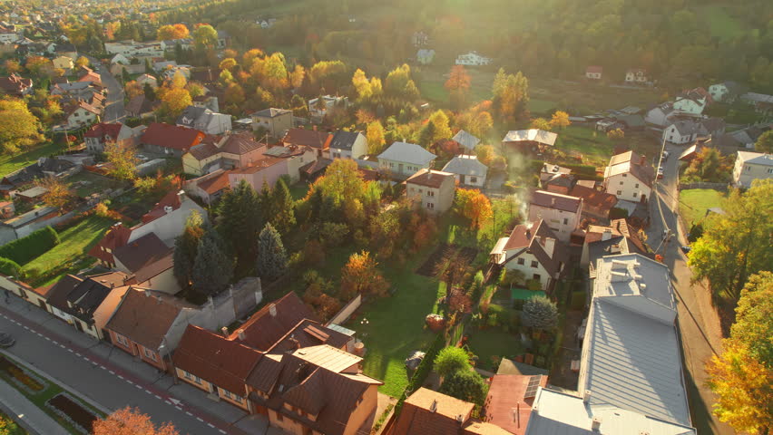 Aerial view of the Stary Sacz town in autumn at sunset, Lesser Poland Voivodeship, Poland. Parish Church of St. Elizabeth of Hungary and cityscape of Stary Sacz. Fall season in Poland