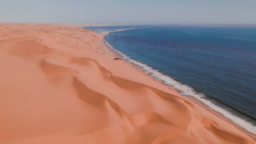 Aerial Drone, Where Desert Meets the Ocean, Sandwich Harbour, Namibia, Africa Royalty-Free Stock Footage #1106820603
