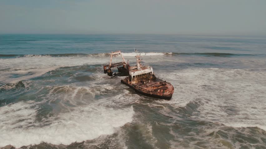 Aerial Drone View of Zeila Shipwreck in Ocean, Skeleton Coast in Namibia,Africa Royalty-Free Stock Footage #1106820617