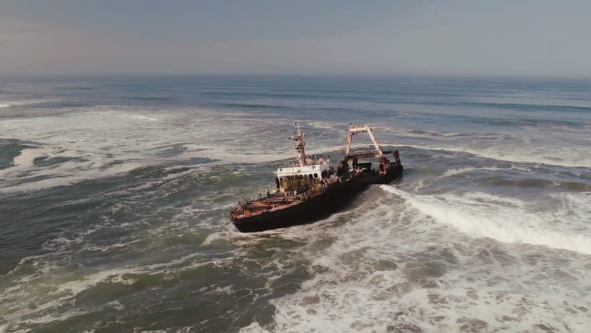 Aerial Drone View of Zeila Shipwreck in Ocean, Skeleton Coast in Namibia,Africa Royalty-Free Stock Footage #1106820631