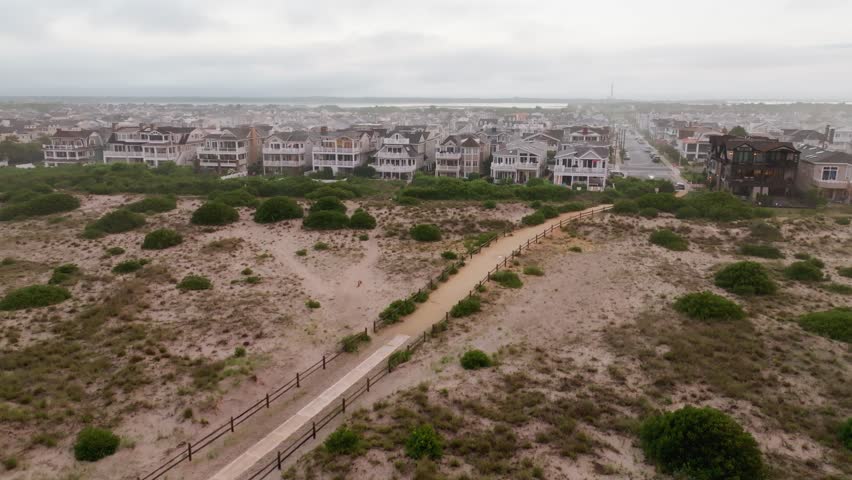 Sunset on the beach over sea overlooking Ocean City New Jersey vacation homes