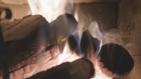 Burning fire In the fireplace.  Clip of a fireplace with flames winter and Christmas holidays concept.