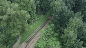 The drone view of hydroelectric pipelines in Baturaden, Central Java, Indonesia. This video was taken on July 31, 2023 by a professional. This aerial video contains a green hydroelectric pipelines