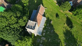 A top-down roll-shot of St Andrew's church and graveyard in Wickhambreaux.