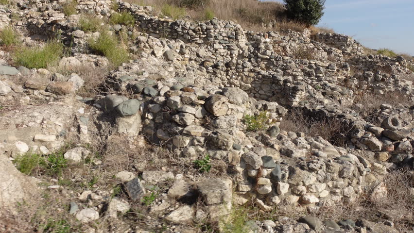 Walking past excavation site of Choirokoitia, an ancient archaeological site that is the earliest permanent settlement in Cyprus
