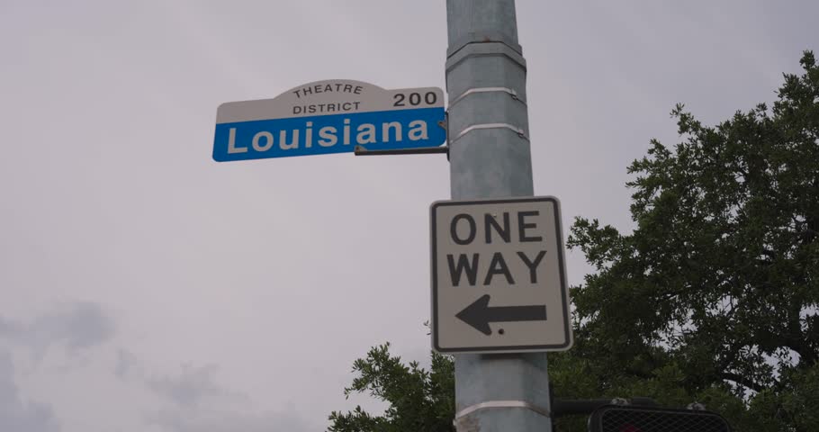 Low angle view of Louisiana Street sign in downtown Houston, Texas