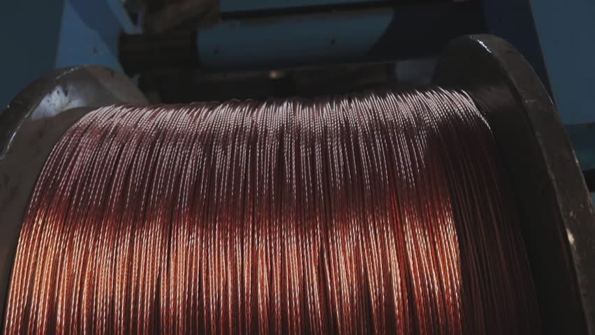 Cable manufacturing facility. A coil of copper cable. Copper cable manufacturing. Non-ferrous metal plant. Wire cable manufacture.
 Royalty-Free Stock Footage #1106864009
