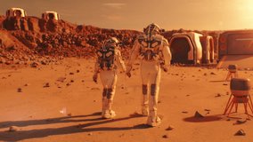 Two astronauts in spacesuits walk toward research station, colony or scientific base on Mars. AI powered rover rides in the background. Space mission. Futuristic colonization and exploration concept. - Powered by Shutterstock - Get 15% off with code: PIKWIZARD15