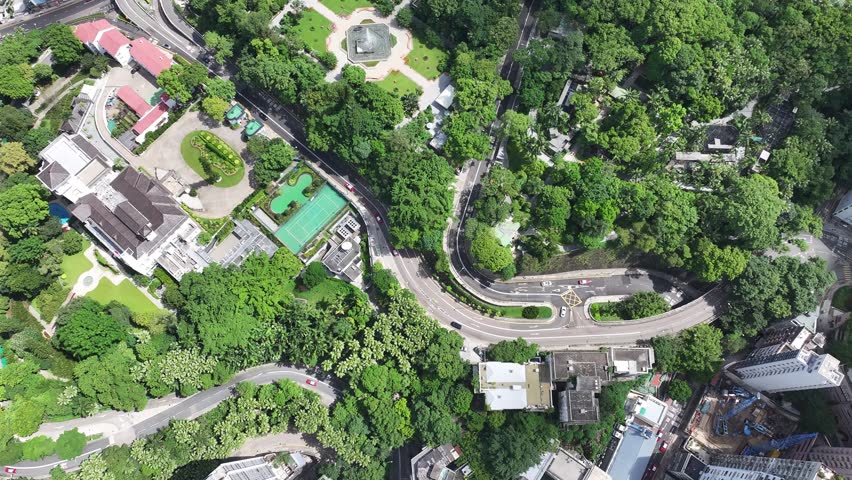 Drone Aerial Skyview of Hong Kong Park and Hong Kong Zoological and Botanical Gardens near Admiralty Central, is a large urban oasis in the bustling HK Island commercial  residential concrete forest
