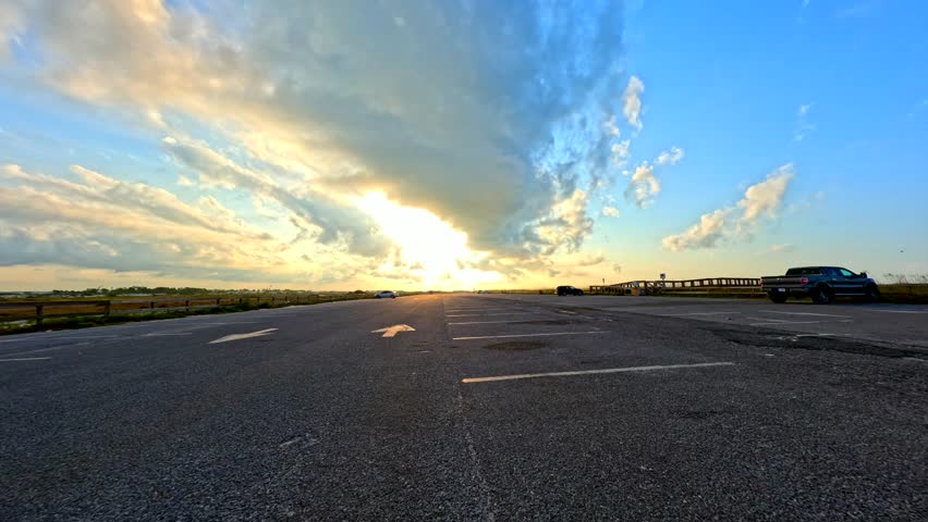 Pensacola Beach sunrise drive through public parking lot