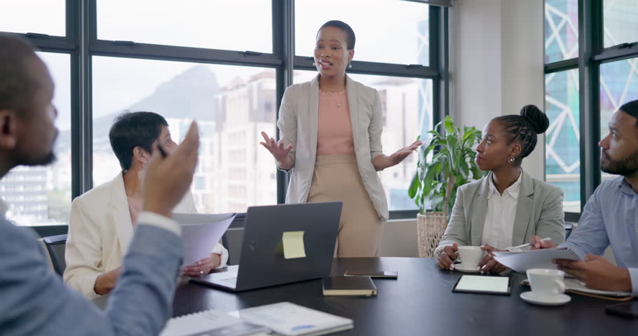 Teamwork, business people or black woman teaching in a meeting for planning, coaching or group training. Asking question, learning or female African CEO talking, helping or speaking in a mentorship Royalty-Free Stock Footage #1106870191