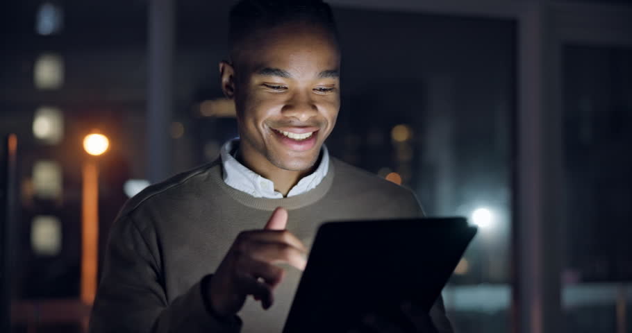 Black man, tablet and walking at night in office for business trading, planning data and reading financial news. Happy trader, broker and working late on digital technology, internet and search app Royalty-Free Stock Footage #1106870449