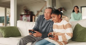 Gaming, family and home with celebration of esports win in living room on a television. Grandpa, young girl and excited from video game and competition goal on tv with a smile of senior man and child