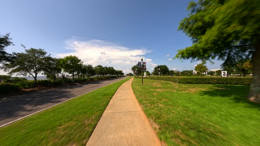 Bike path perimeter at Veterans Memorial Park Pensacola Florida pov 4k