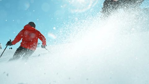 Super Slow Motion of Piste Skier Running Down. Sunny Day, Austria Alps, Europe. Filmed on High Speed Cinema Camera, 1000fps. Speed Ramp Effect. วิดีโอสต็อก