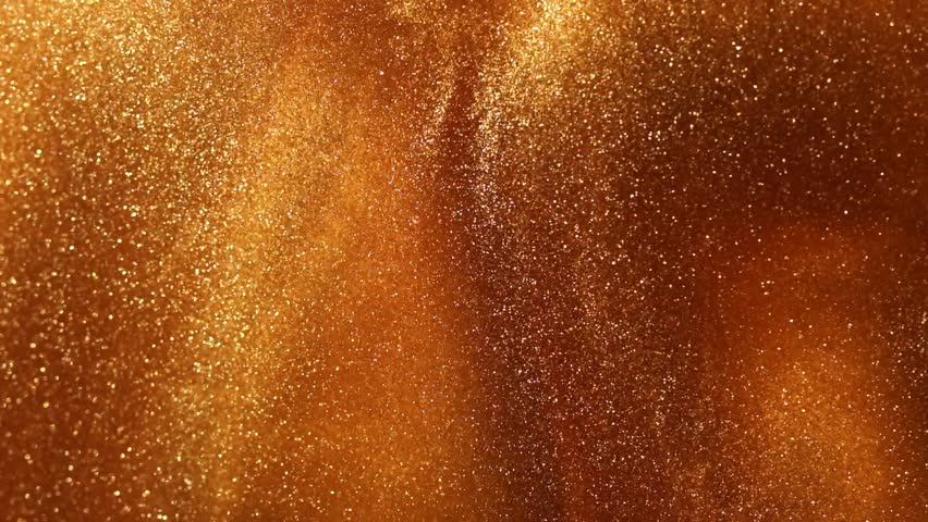 Slow Motion gold particles in liquid. A magical galaxy of countless golden dust particles in fluid motion. Abstract glistering background. - Powered by Shutterstock - Get 15% off with code: PIKWIZARD15
