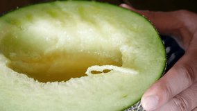 A video of eating a sweet melon.
