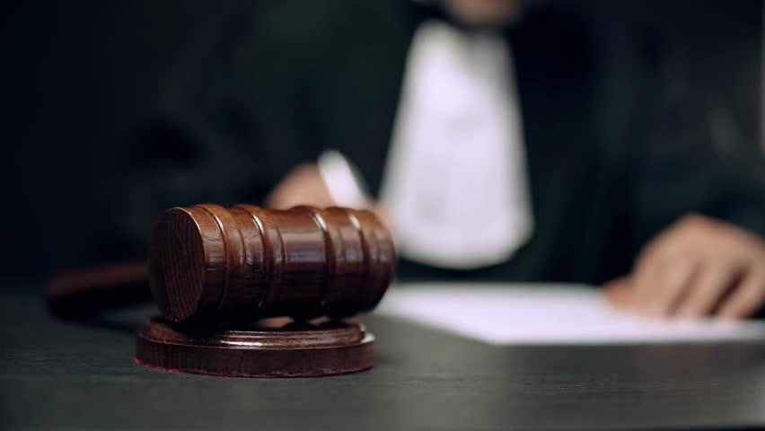 Financial claim lawsuit judged by a judge hammering his gavel in the courtroom Legalization concept. Crime punishment Royalty-Free Stock Footage #1106893695